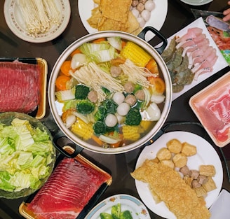 sliced vegetables on stainless steel cooking pot